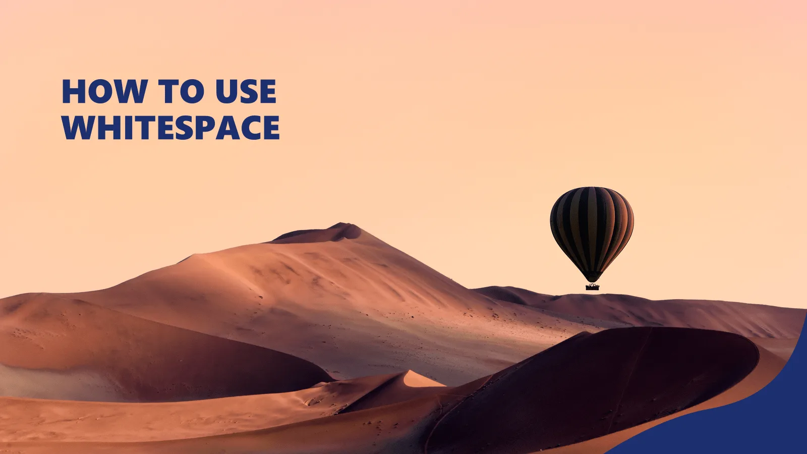 Sand dunes, a yellow sky and a hot air balloon on the right, with a whitespace title on the left